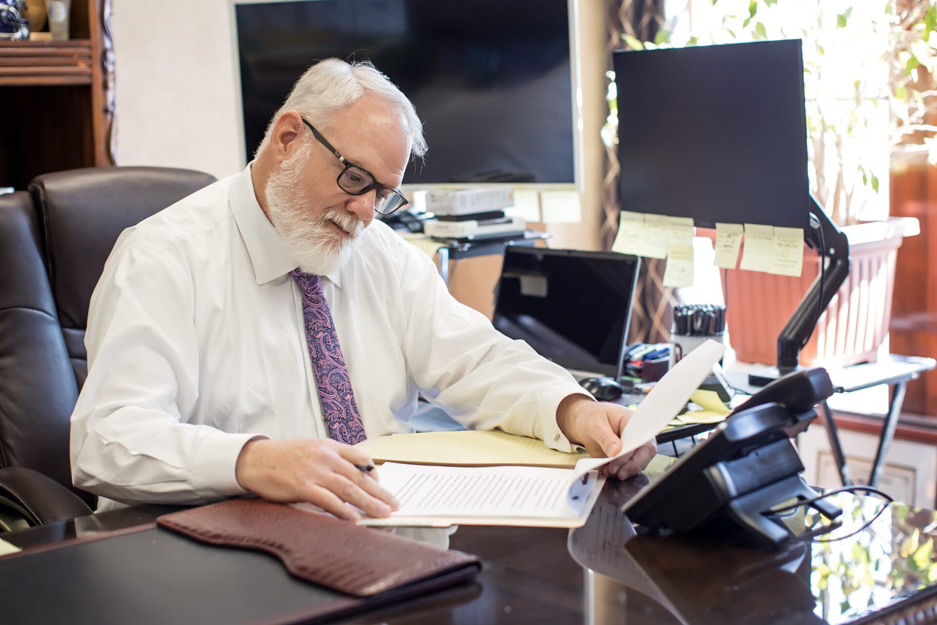 Lance B. Phillips reading book